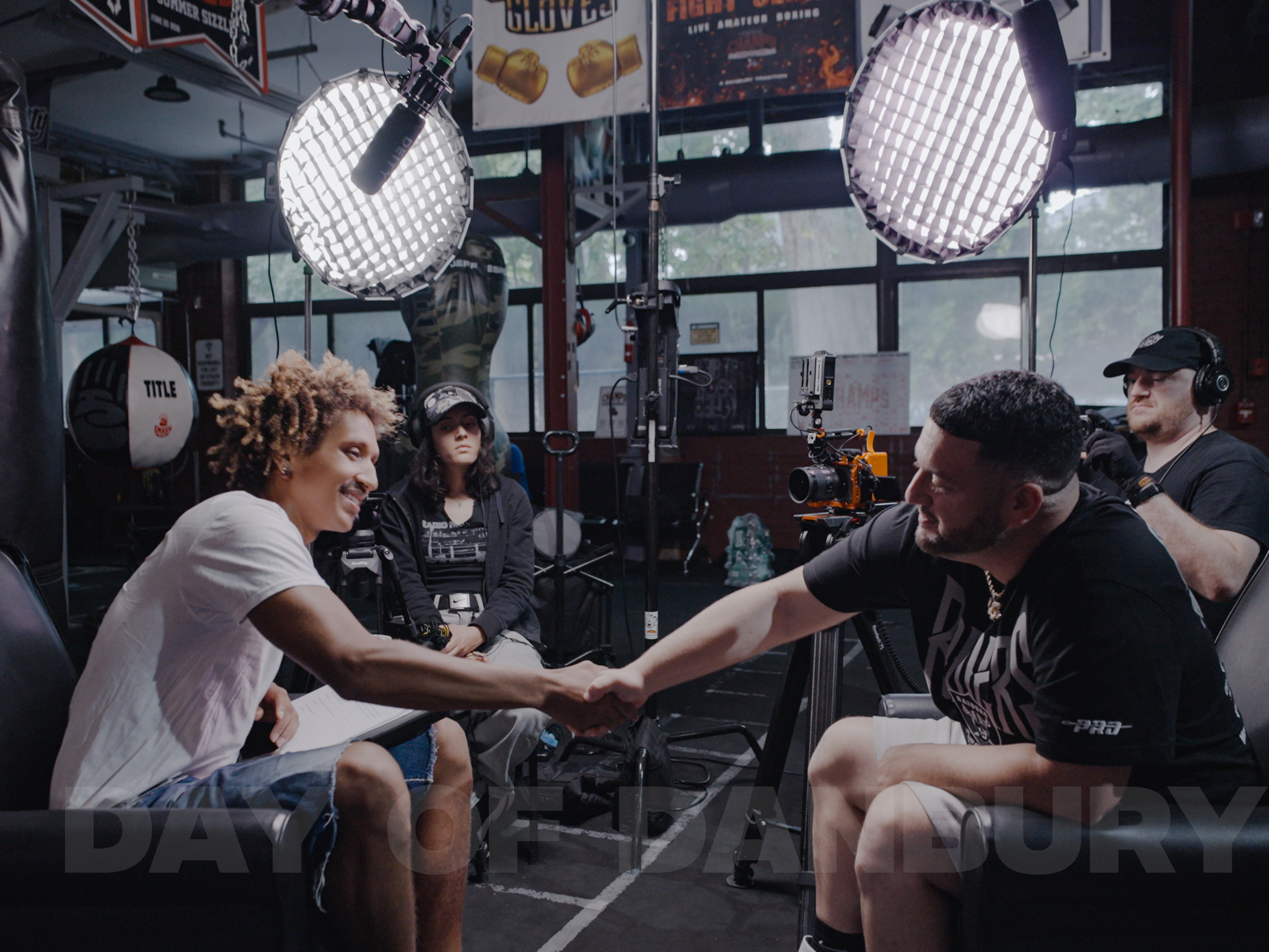 Documentary still — Mayo handshake